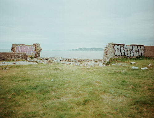 Graffiti and a broken wall, Dublin. From a series documenting County Dublin, Ireland.